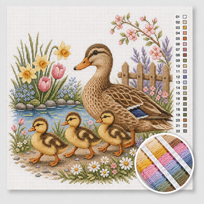 Eendenfamilie aan de vijver kruissteek pakket — moedereend met drie eendjes tussen narcissen, tulpen en lentebloemen