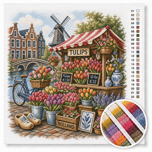 Amsterdamse bloemenmarkt met tulpenkraam kruissteek pakket — kleurrijke tulpen, klompen, rode fiets en molen op de achtergrond