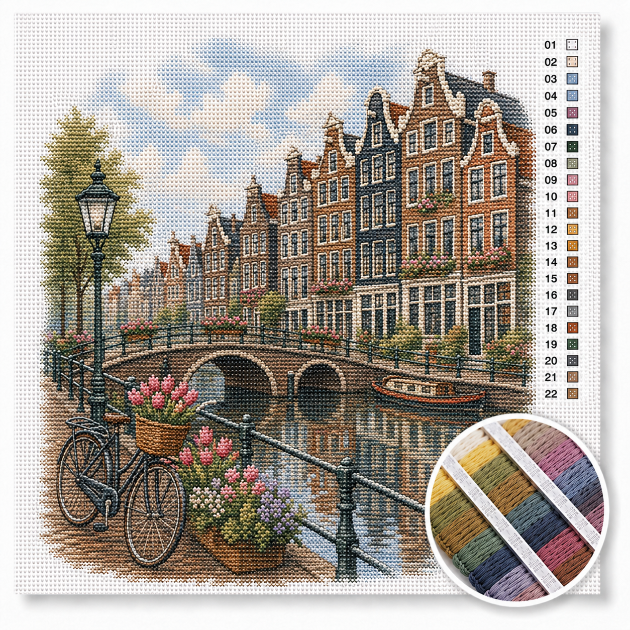 Amsterdamse grachten kruissteek pakket — grachtenpanden, bruggetje over de gracht en fiets met tulpen