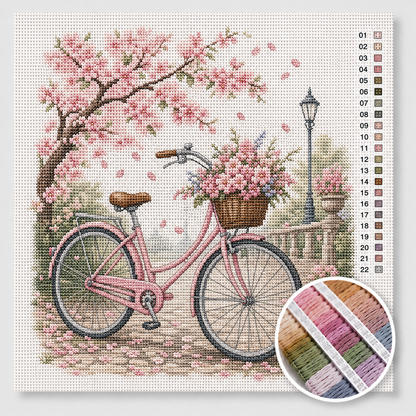 Kersenbloesem kruissteek pakket — roze vintage fiets onder bloeiende sakura