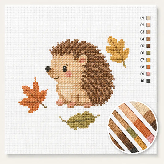 Egeltje tussen herfstblaadjes kruissteek pakket — eenvoudig beginnersdesign met tien kleuren